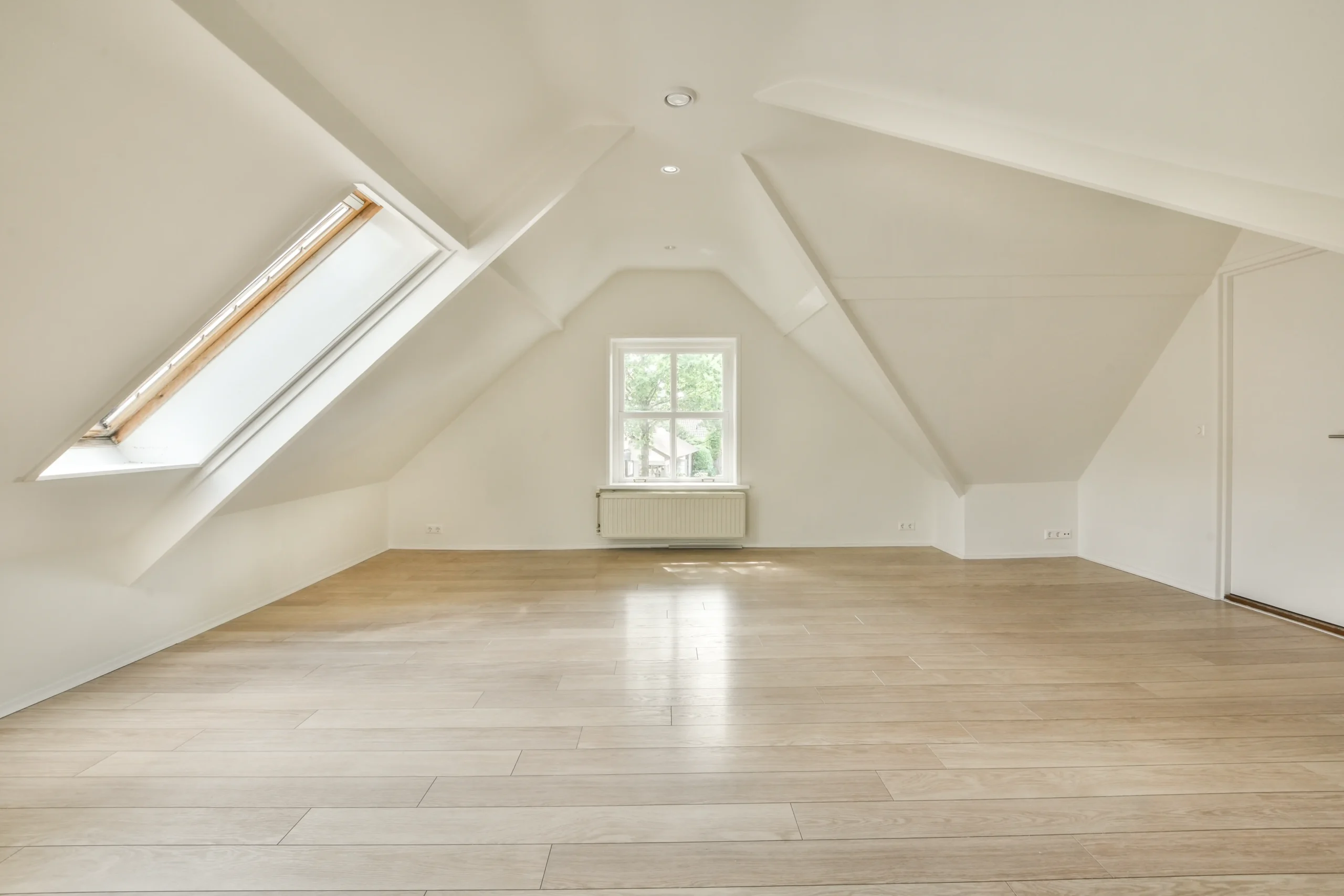 Finished loft conversion bedroom with dormer window