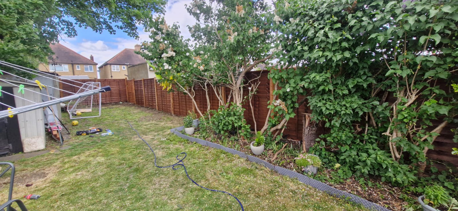 Rear garden with new fence panels installed by Propfix