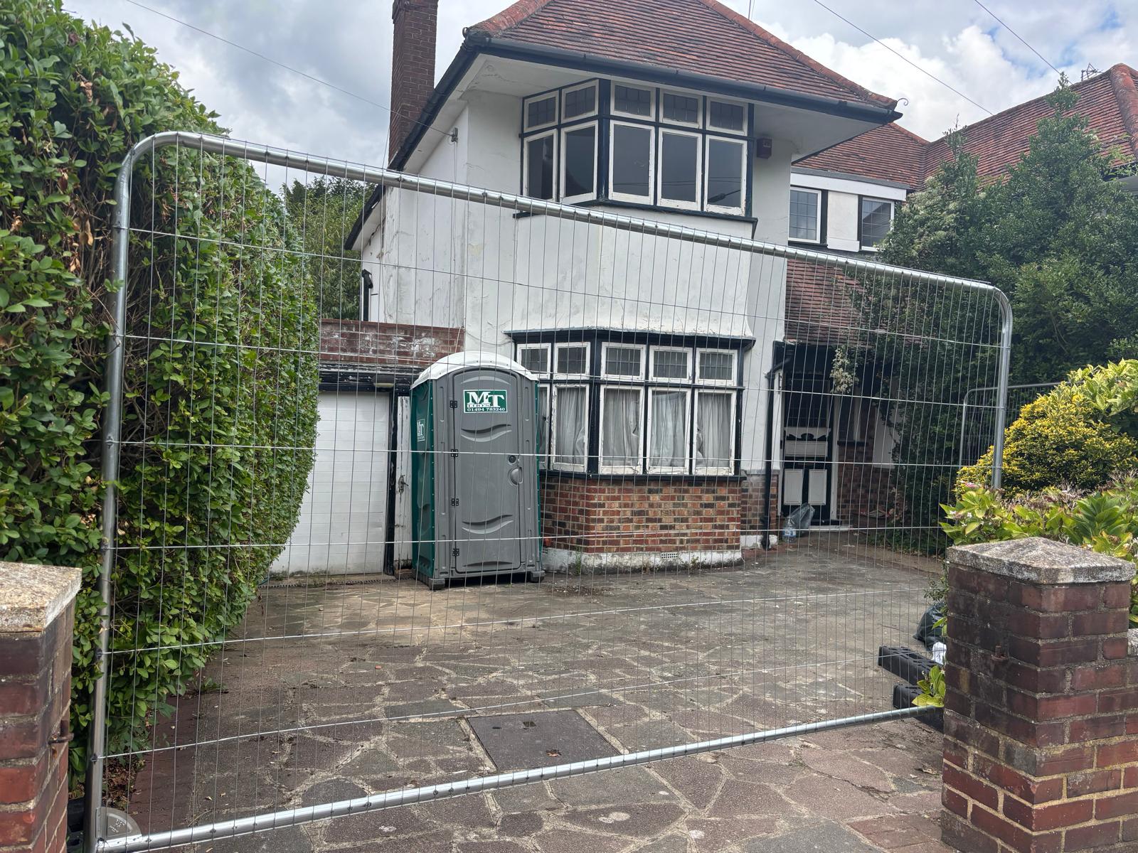 Semi-detached house exterior during Propfix renovation works